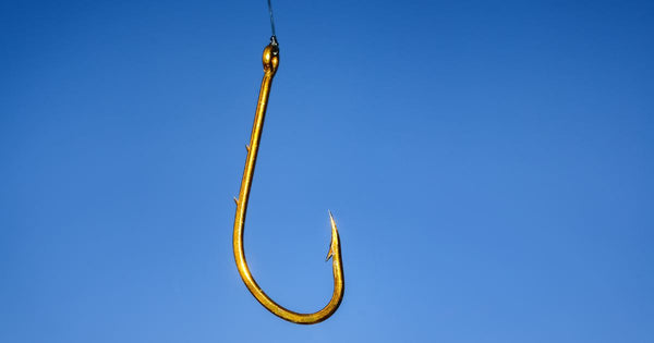A fishing hook with a blue background