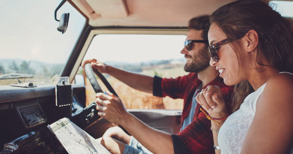 Couple navigating on a road trip